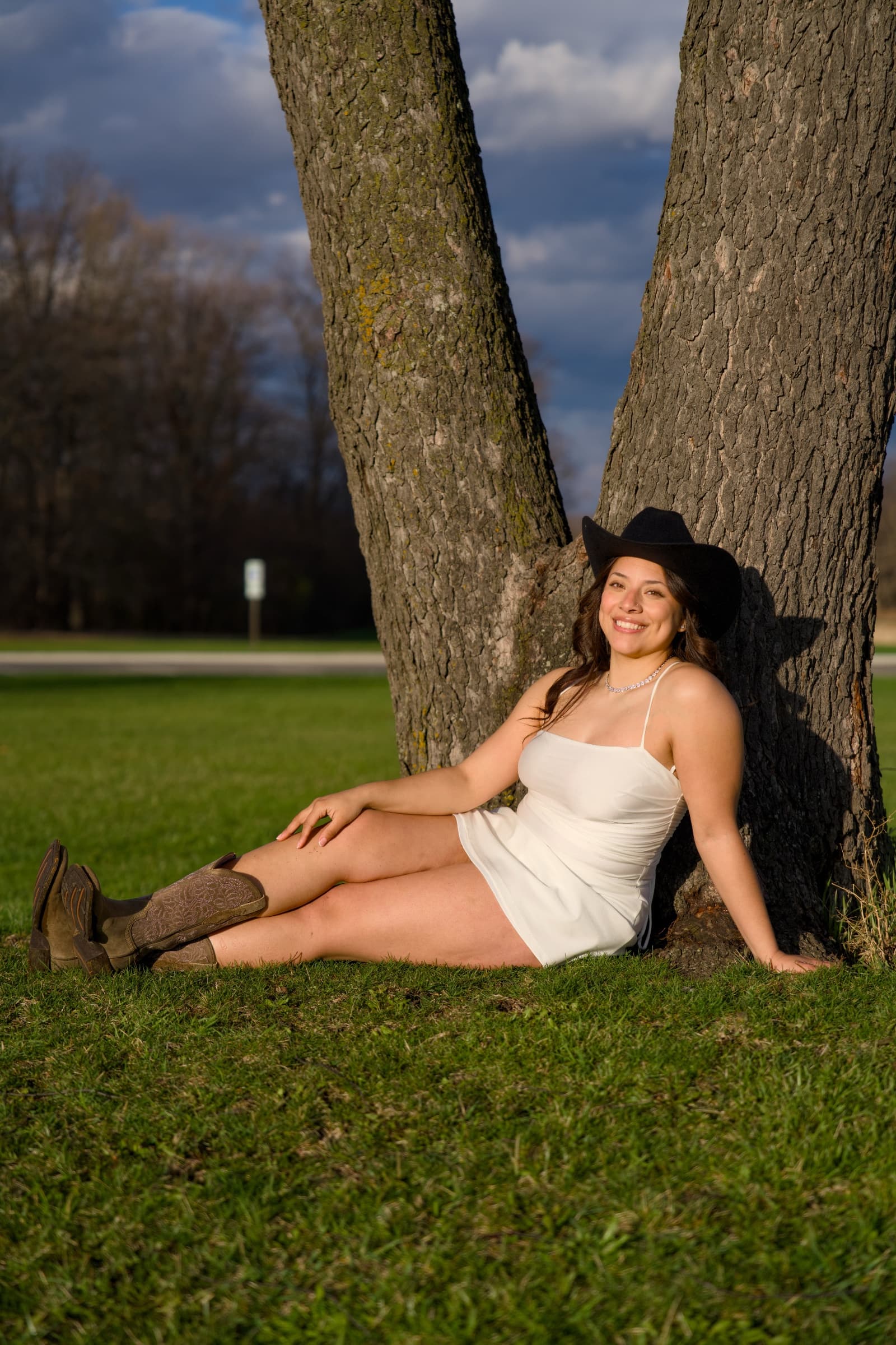 Birthday portrait in cowboy hat at golden hour